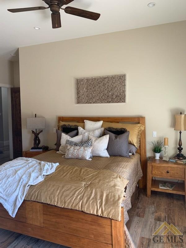Undisclosed Address Arroyo Grande, CA 93420 - Photo 38 of 39 a bedroom with a bed and a ceiling fan