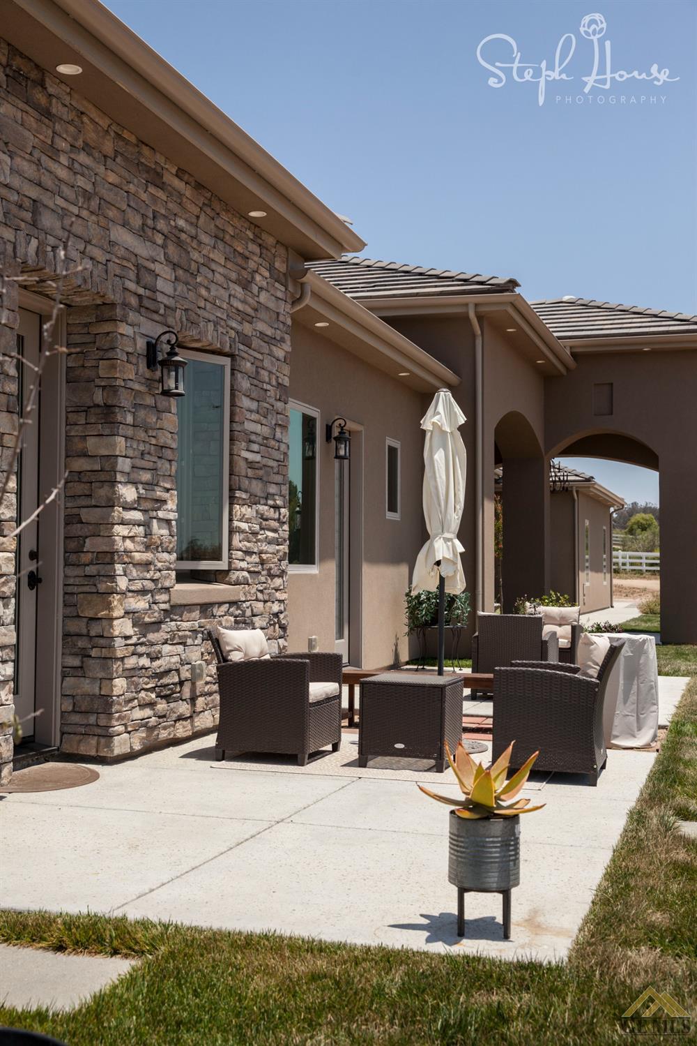 Undisclosed Address Arroyo Grande, CA 93420 - Photo 8 of 39 a front view of house with outdoor seating