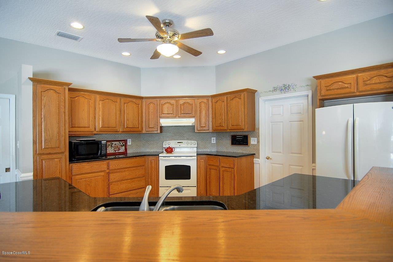 4075 Sparrow Hawk Road Melbourne, FL 32934 - Photo 9 of 15 kitchen2 (21)