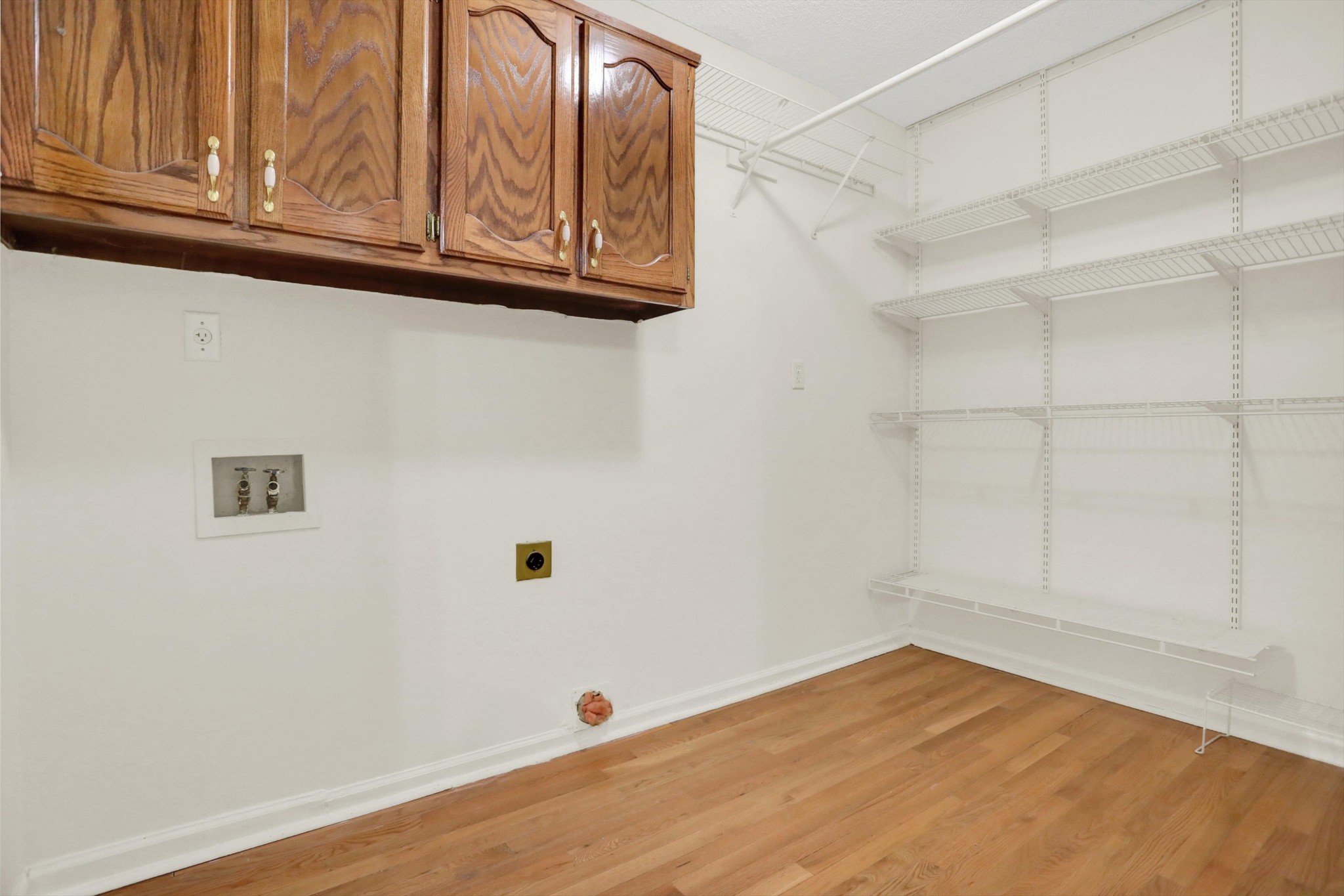 1130 Sugar Lane Collierville, TN 38017 - Photo 12 of 29 a view of a closet area with wooden floor