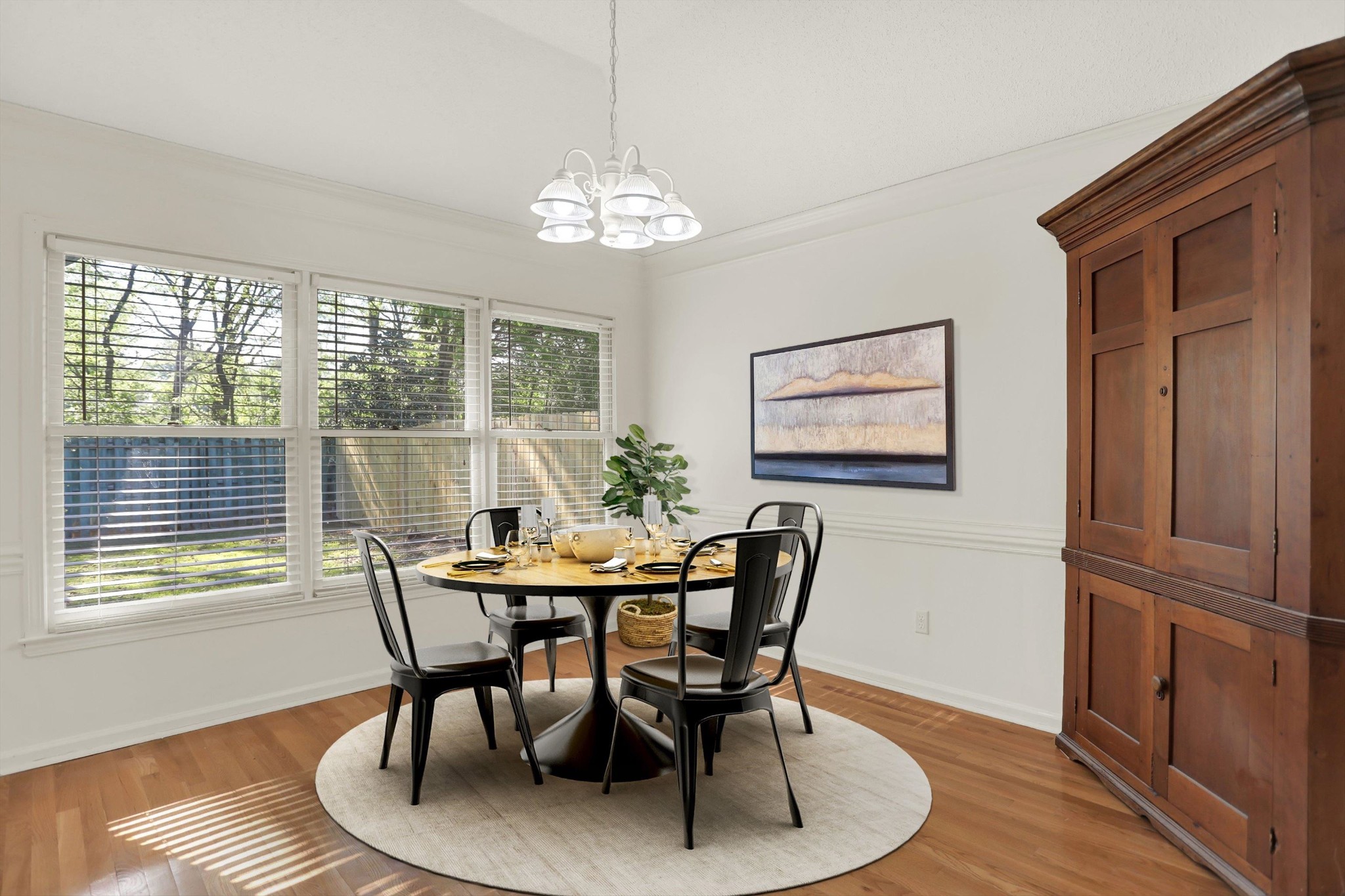 1130 Sugar Lane Collierville, TN 38017 - Photo 14 of 29 a view of a dining room with furniture window and wooden floor
