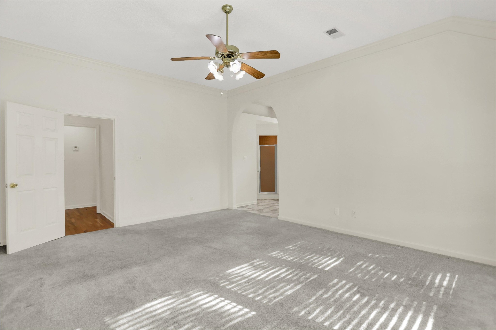 1130 Sugar Lane Collierville, TN 38017 - Photo 18 of 29 a view of an empty room with a chandelier fan