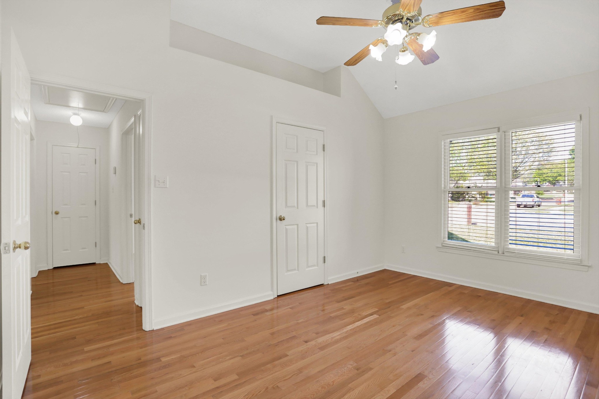 1130 Sugar Lane Collierville, TN 38017 - Photo 25 of 29 a view of empty room with wooden floor and fan