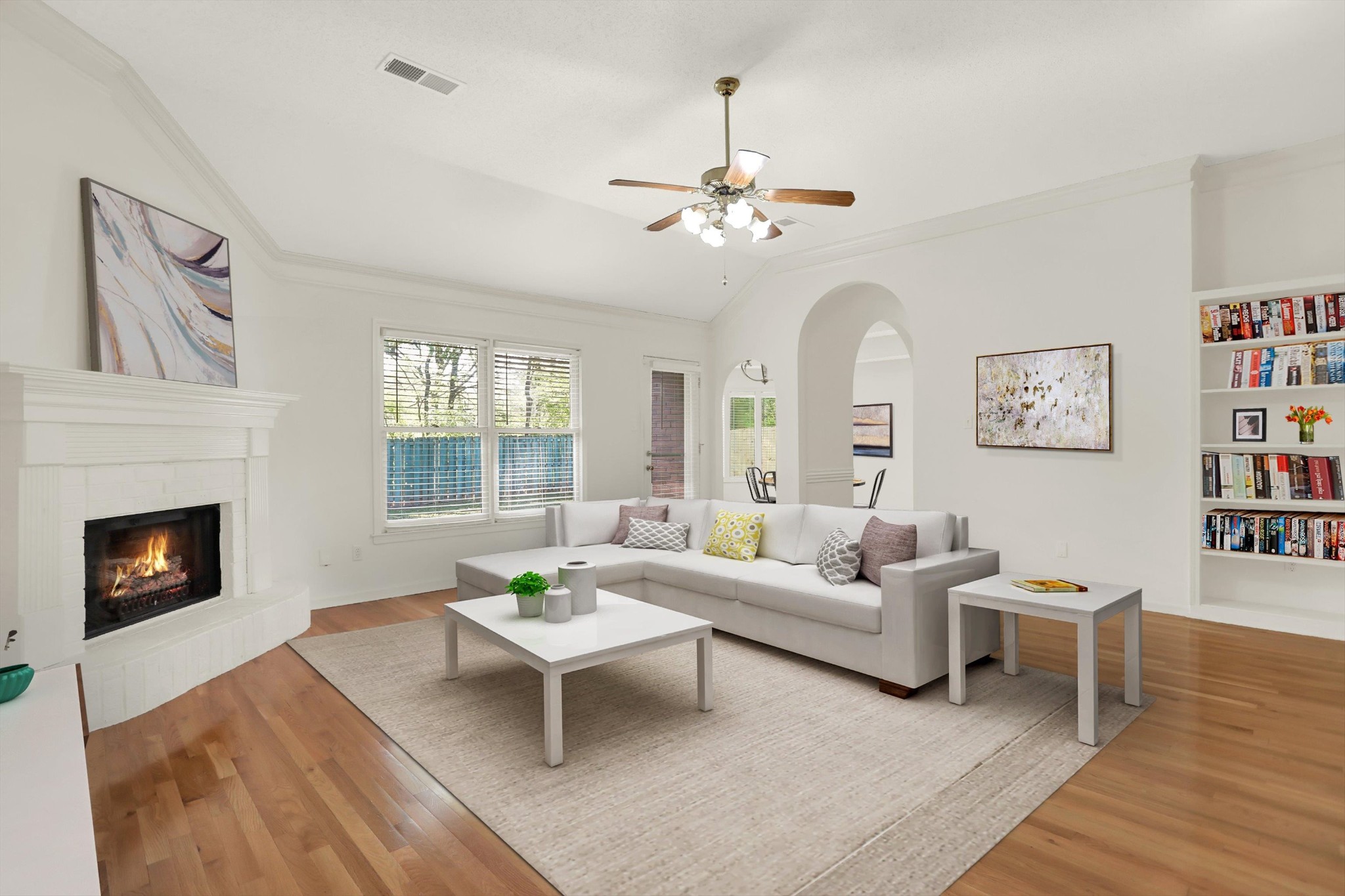 1130 Sugar Lane Collierville, TN 38017 - Photo 8 of 29 a living room with furniture a fireplace and a ceiling fan