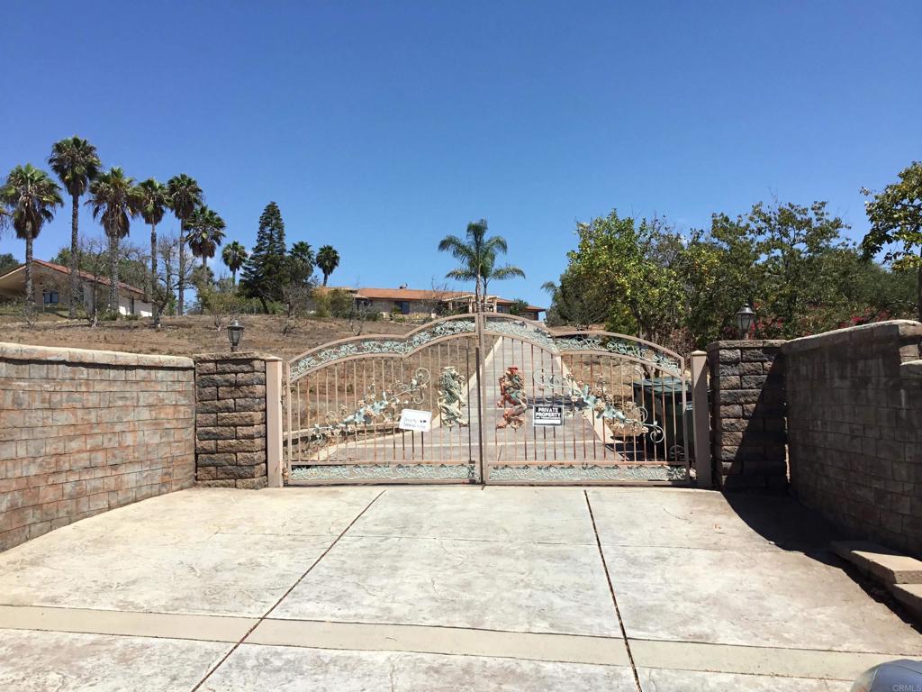 4592 Sleeping Indian Road Fallbrook, CA 92028 - Photo 1 of 1 a view of a brick house with an outdoor space