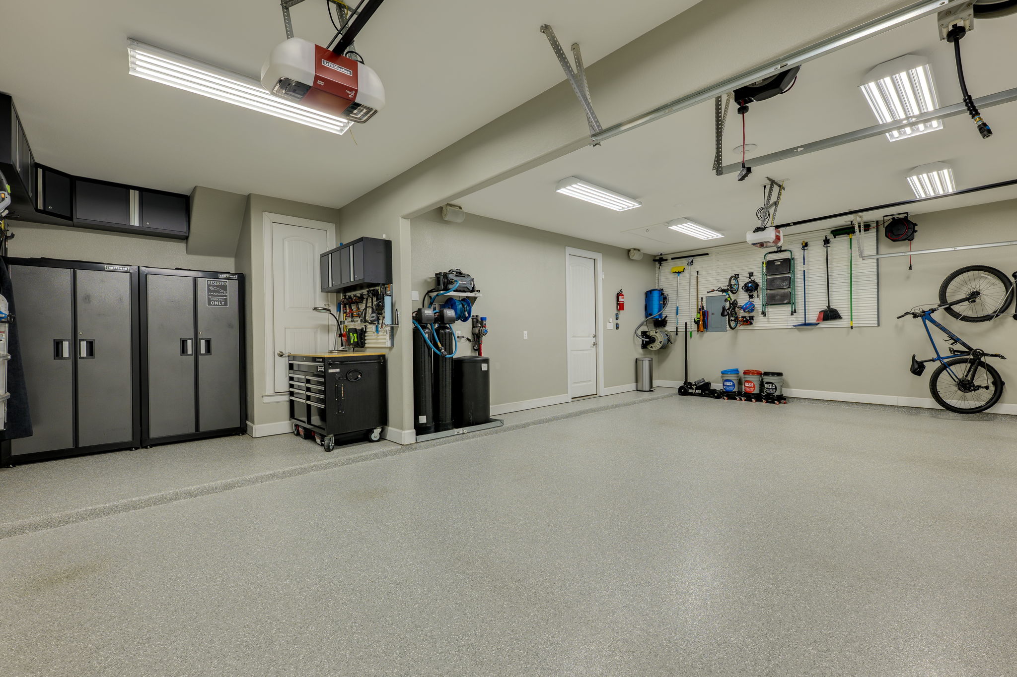 3300 Venezia View Leander, TX 78641 - Photo 23 of 33 3 car garage with an 8 foot bump out; Epoxy floor; Speakers