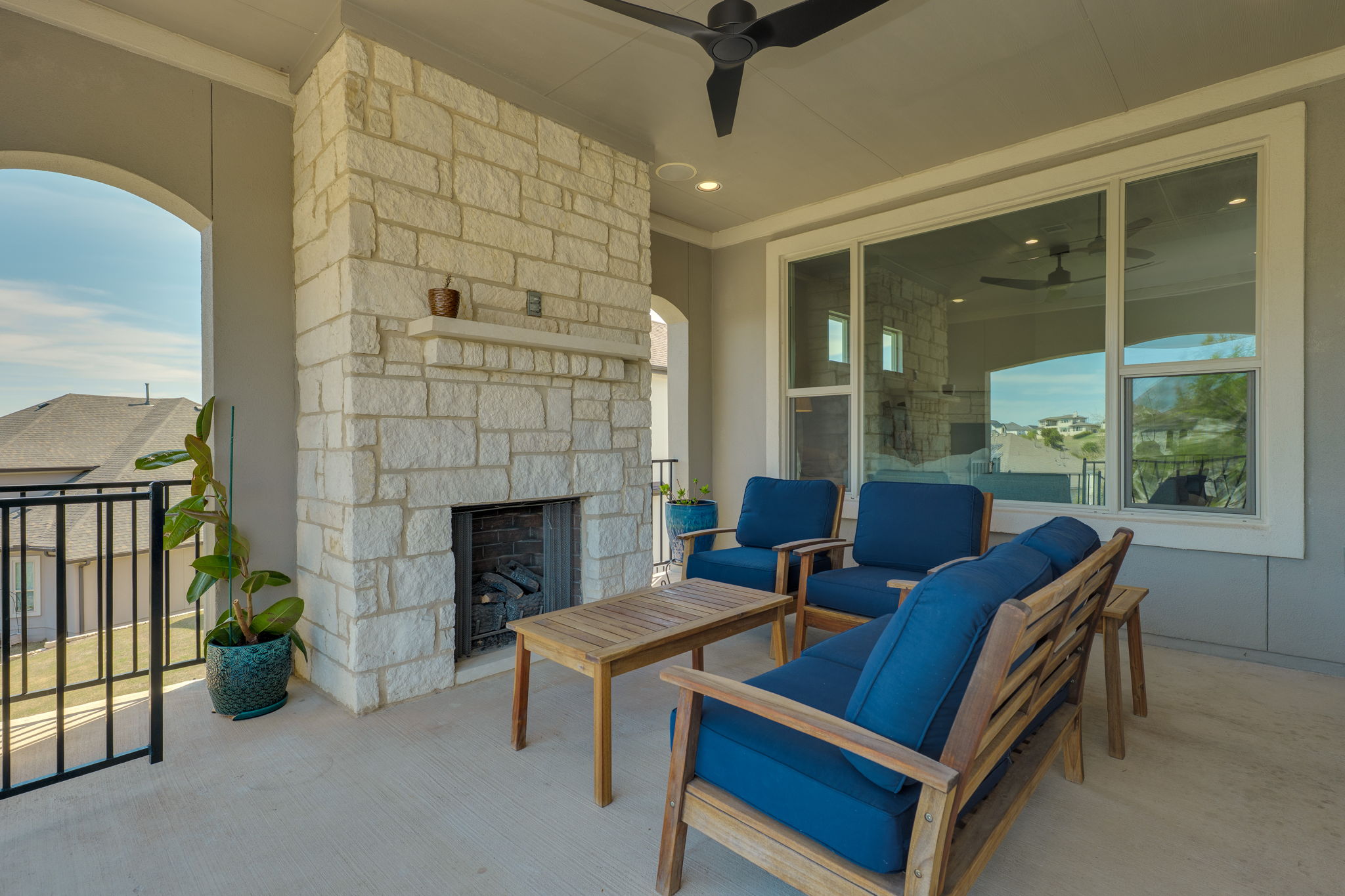 3300 Venezia View Leander, TX 78641 - Photo 29 of 33 Outdoor fireplace with gas logs; Ceiling fan and outdoor speakers