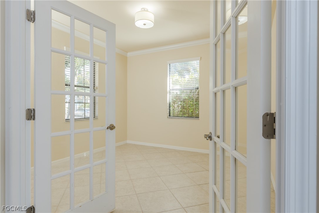 12906 Pastures Way Fort Myers, FL 33913 - Photo 13 of 44 an empty room with windows