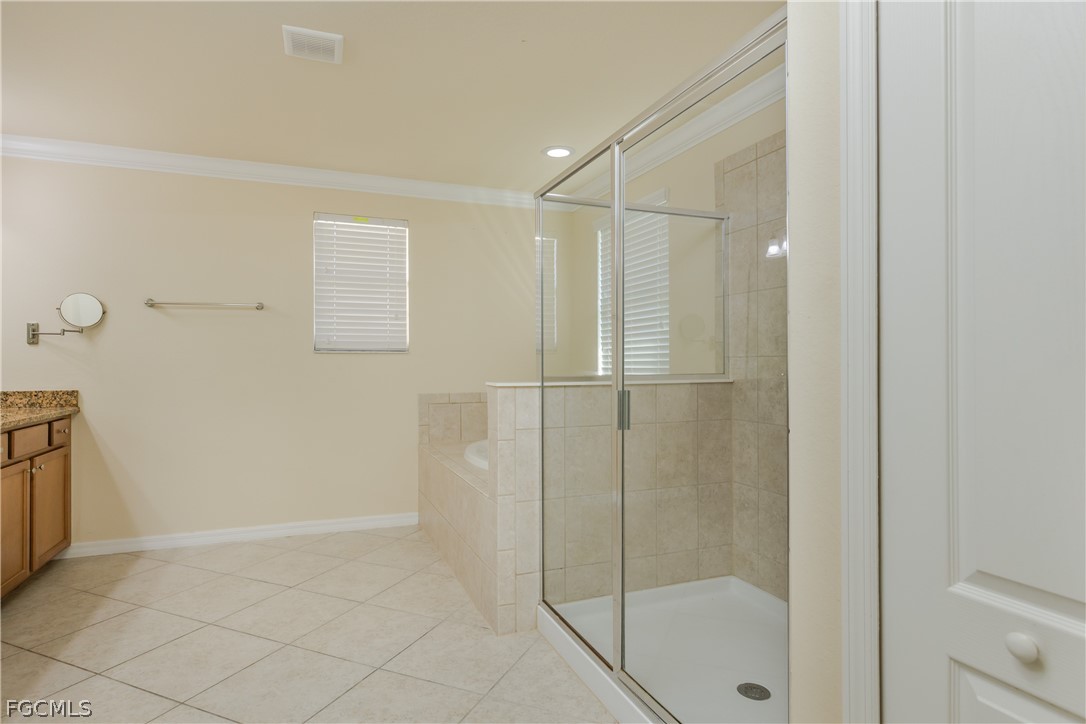 12906 Pastures Way Fort Myers, FL 33913 - Photo 16 of 44 a bathroom with a shower