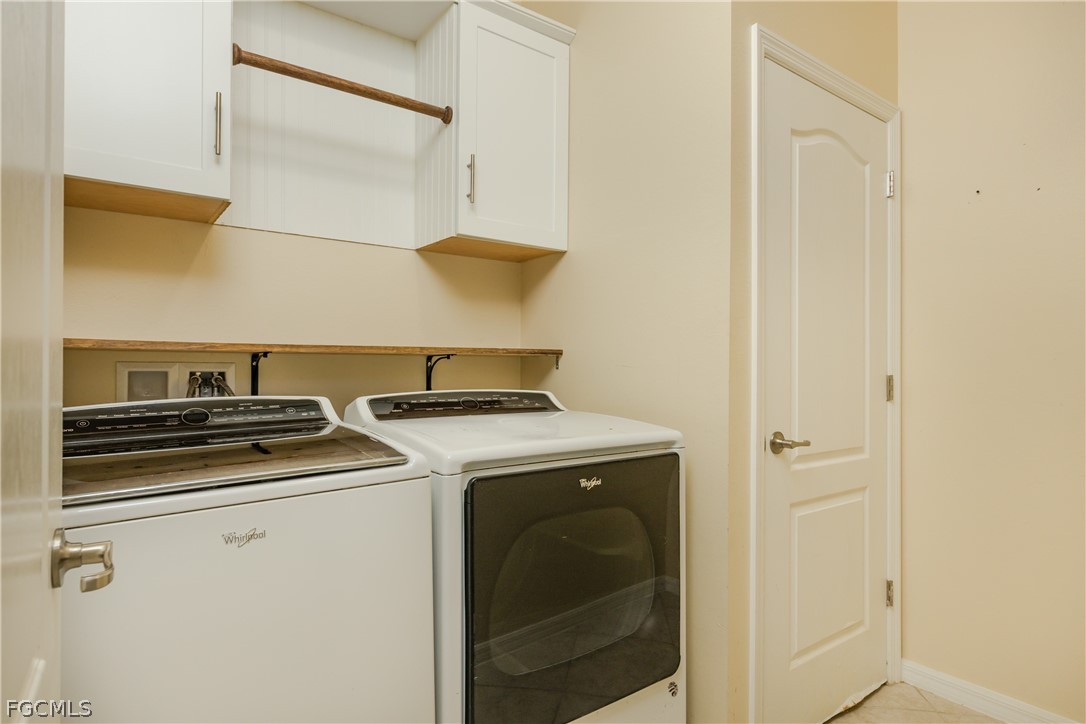 12906 Pastures Way Fort Myers, FL 33913 - Photo 23 of 44 a utility room with dryer and washer