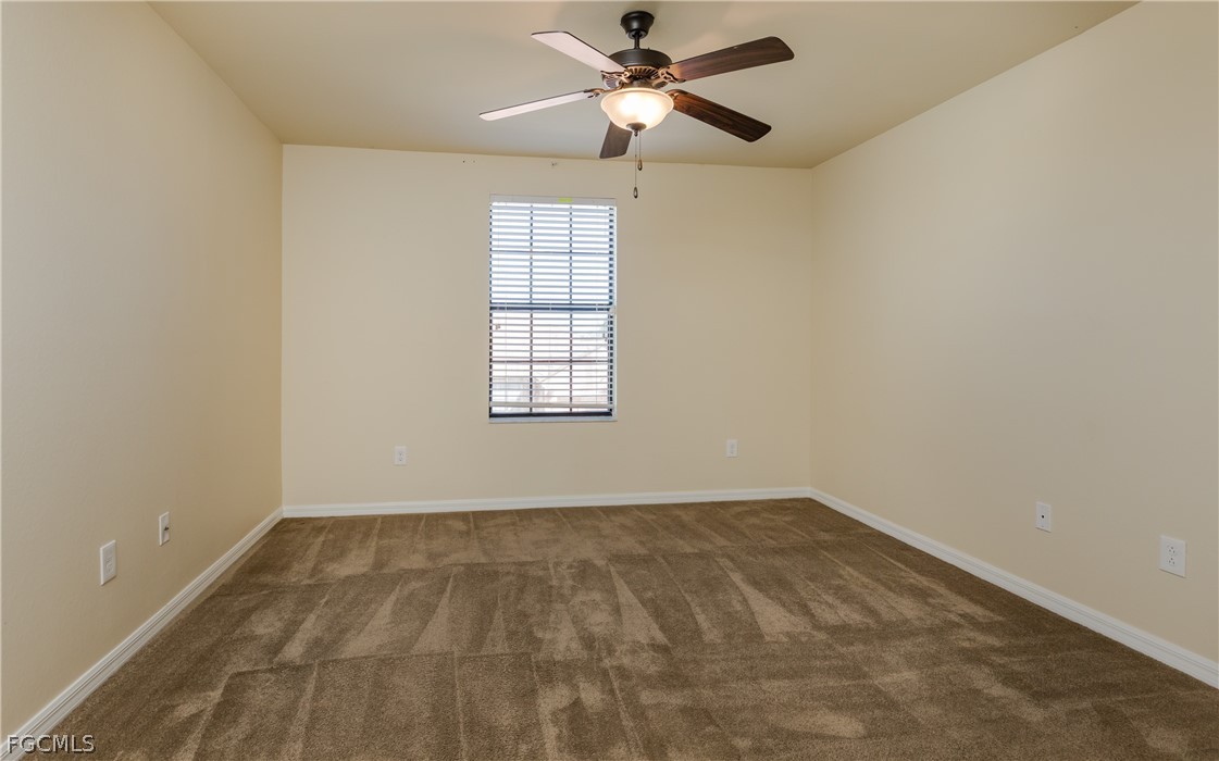12906 Pastures Way Fort Myers, FL 33913 - Photo 28 of 44 a view of an empty room with a window