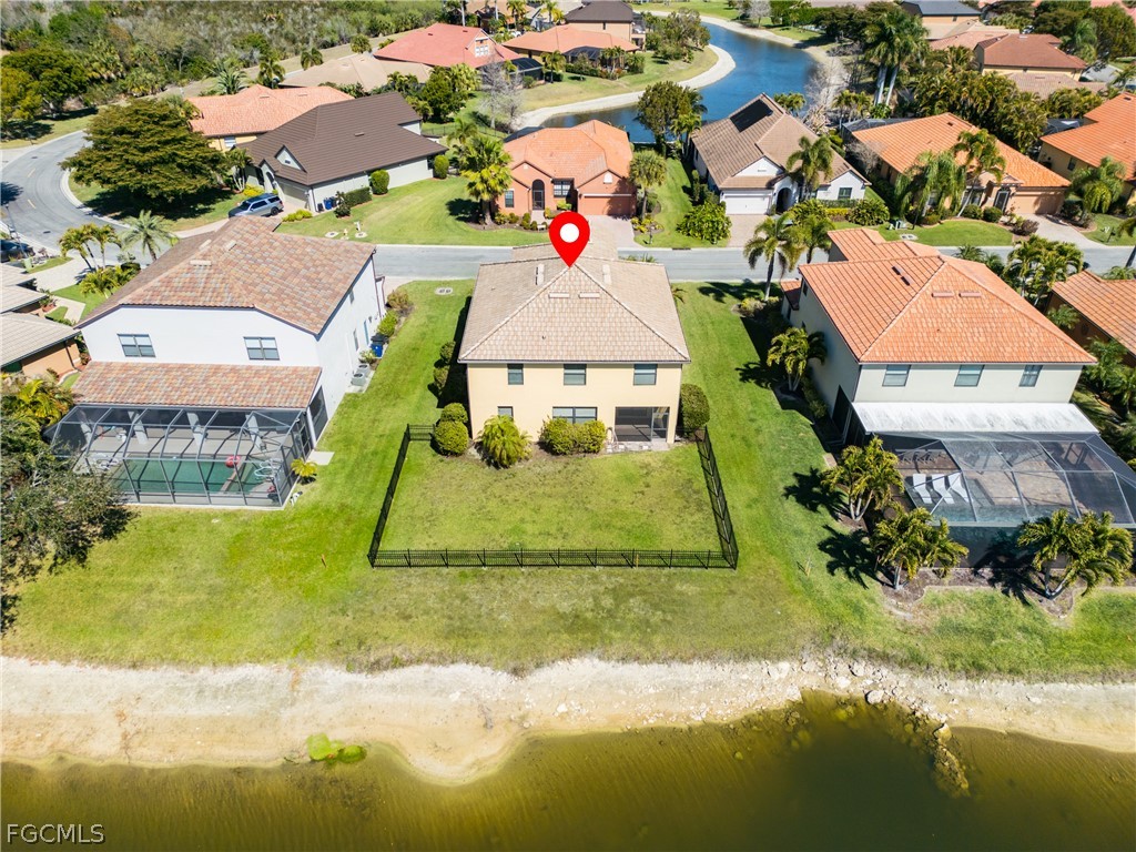 12906 Pastures Way Fort Myers, FL 33913 - Photo 39 of 44 an aerial view of residential houses with outdoor space and swimming pool