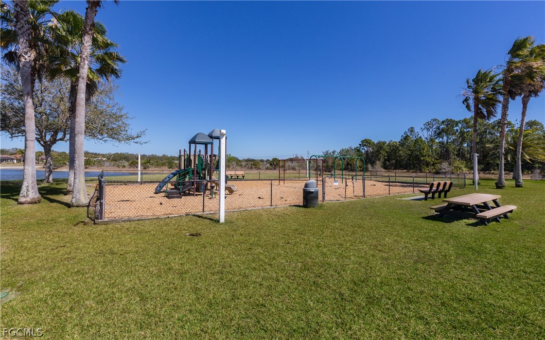 12906 Pastures Way Fort Myers, FL 33913 - Photo 43 of 44 a view of a garden with a slide