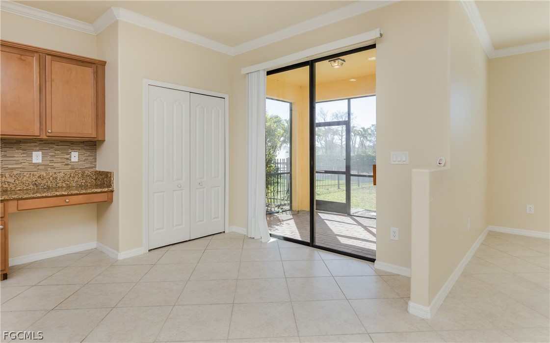 12906 Pastures Way Fort Myers, FL 33913 - Photo 10 of 44 a view of an entryway with kitchen