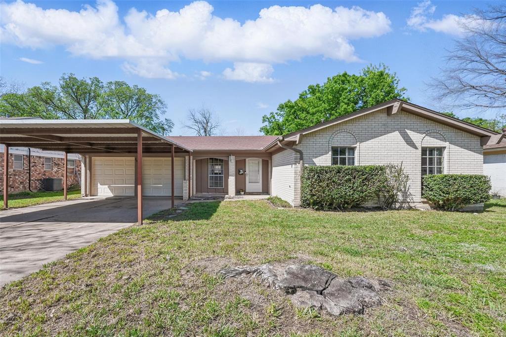 832 Marlene Drive Everman, TX 76140 - Photo 1 of 1 a front view of a house with a garden