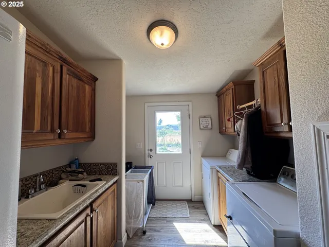 a kitchen with a stove and a refrigerator