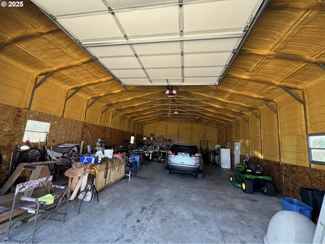 a view of garage with furniture