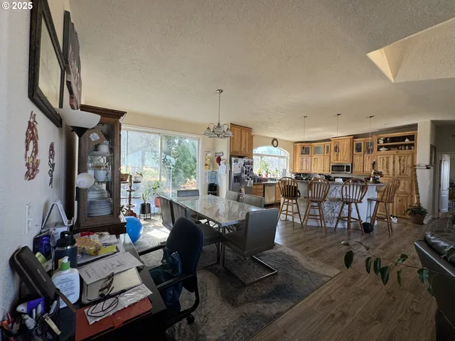 a view of a dining room with furniture window and outside view