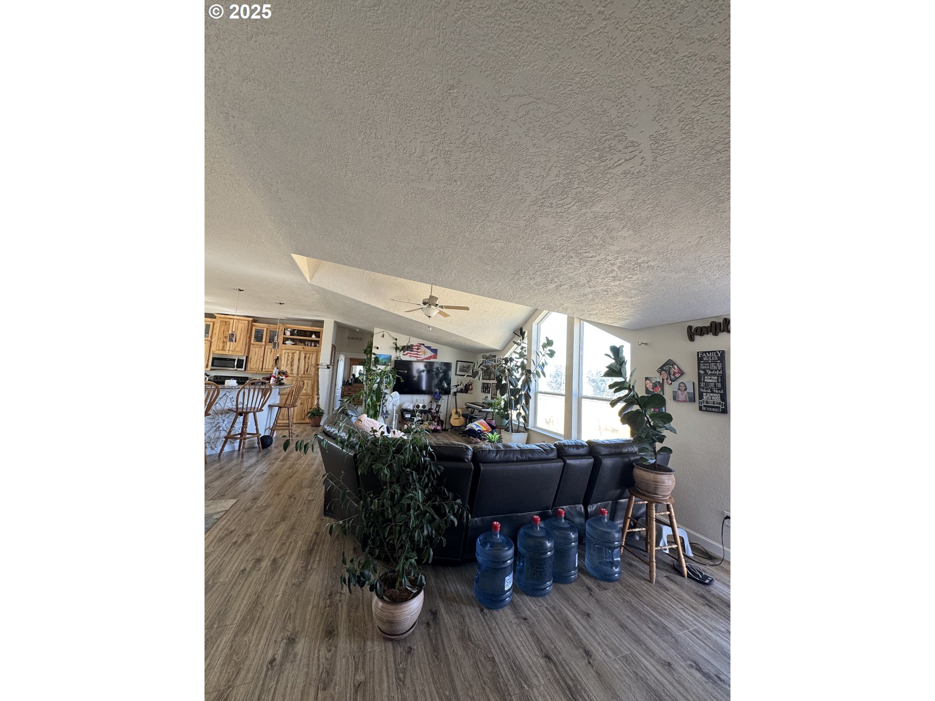70753 Quail Lane Boardman, OR 97818 - Photo 9 of 26 a view of a dining room with furniture and wooden floor