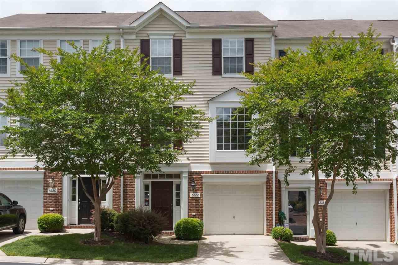 5222 Echo Ridge Road Raleigh, NC 27612 - Photo 2 of 25 a front view of a house with garden