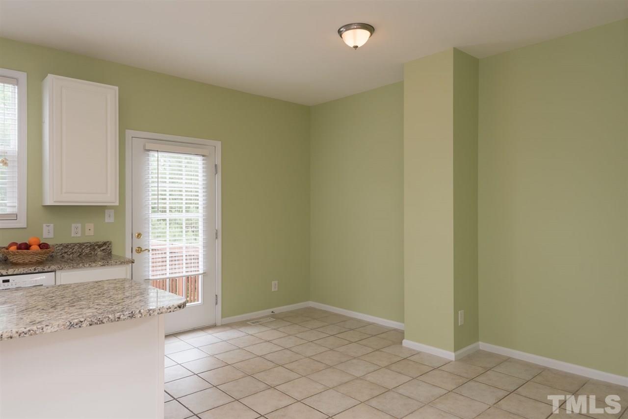 5222 Echo Ridge Road Raleigh, NC 27612 - Photo 14 of 25 a view of a kitchen with a sink and a window