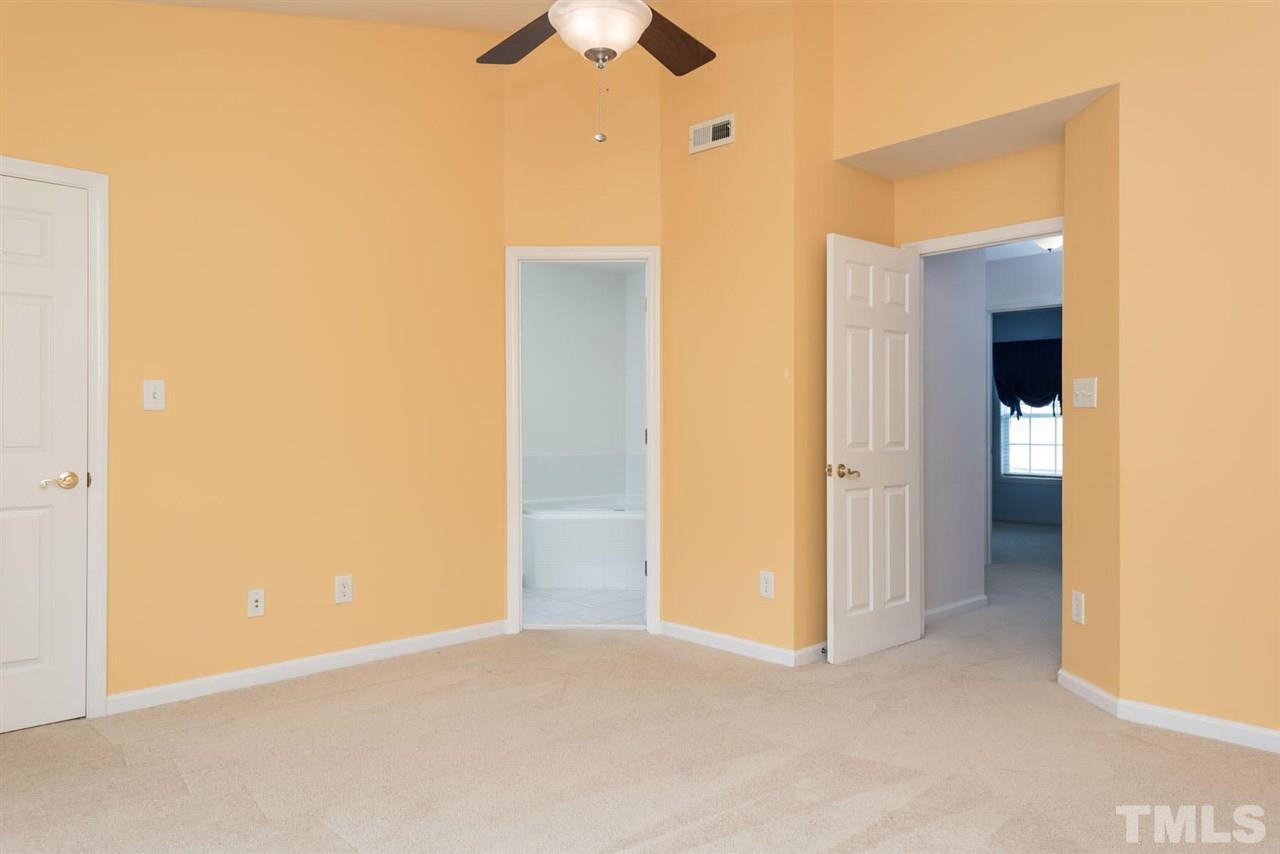 5222 Echo Ridge Road Raleigh, NC 27612 - Photo 18 of 25 a view of an empty room with a bathroom