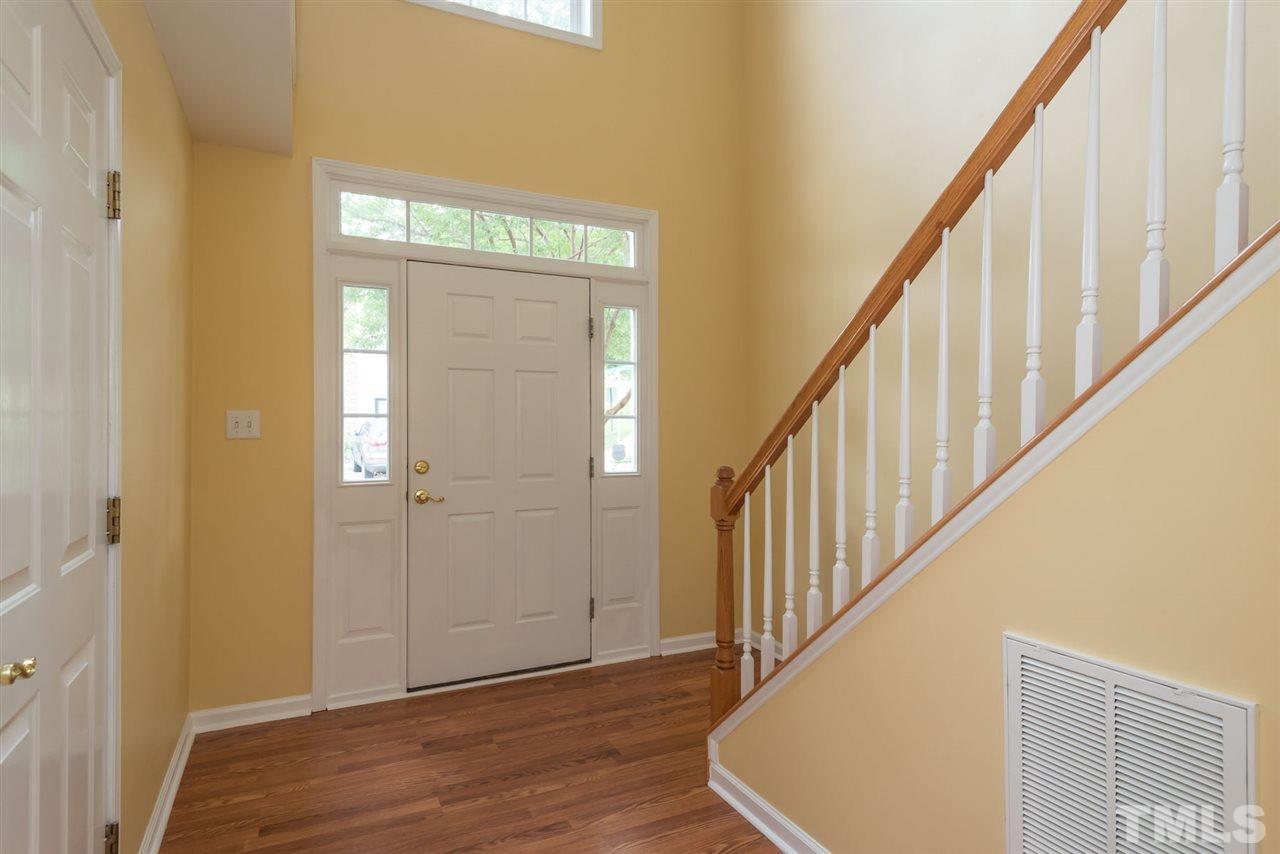5222 Echo Ridge Road Raleigh, NC 27612 - Photo 3 of 25 a view of an entryway with wooden floor