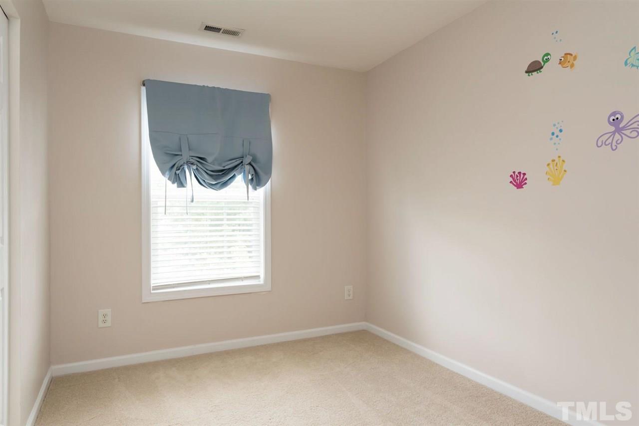 5222 Echo Ridge Road Raleigh, NC 27612 - Photo 24 of 25 a room that has a window in it