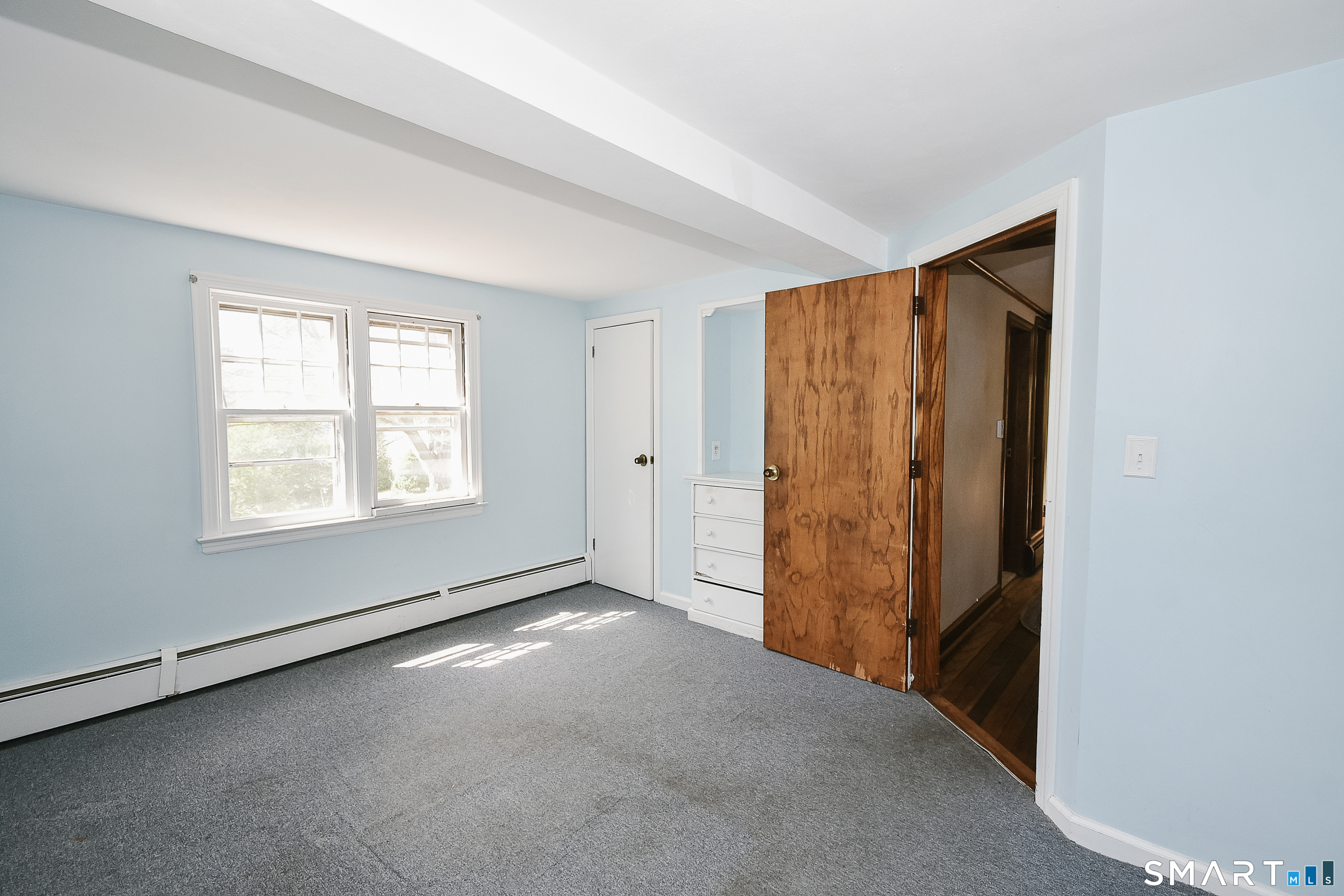 213 Hart Street Berlin, CT 06037 - Photo 20 of 40 an empty room with windows and closet