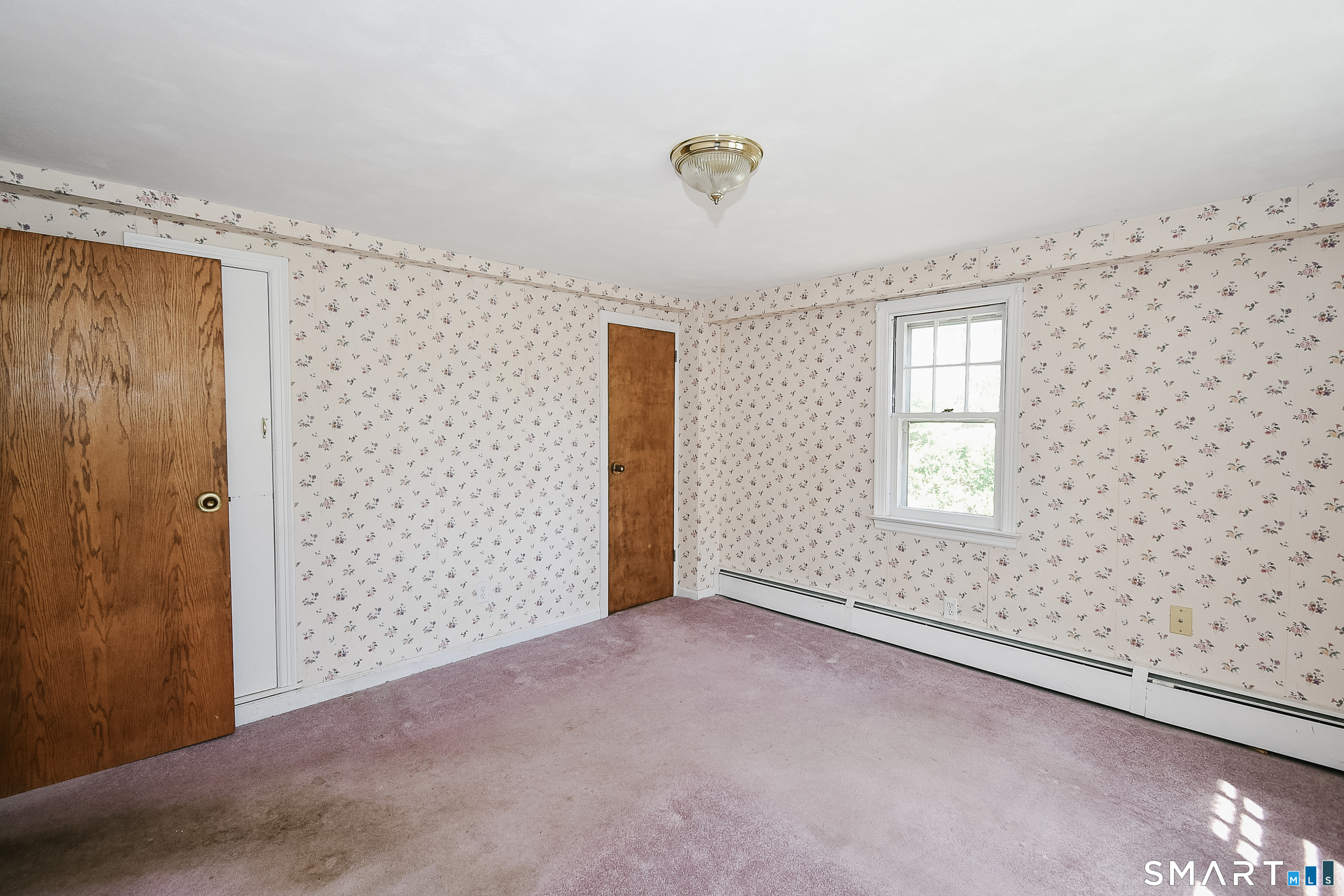 213 Hart Street Berlin, CT 06037 - Photo 21 of 40 an empty room with windows