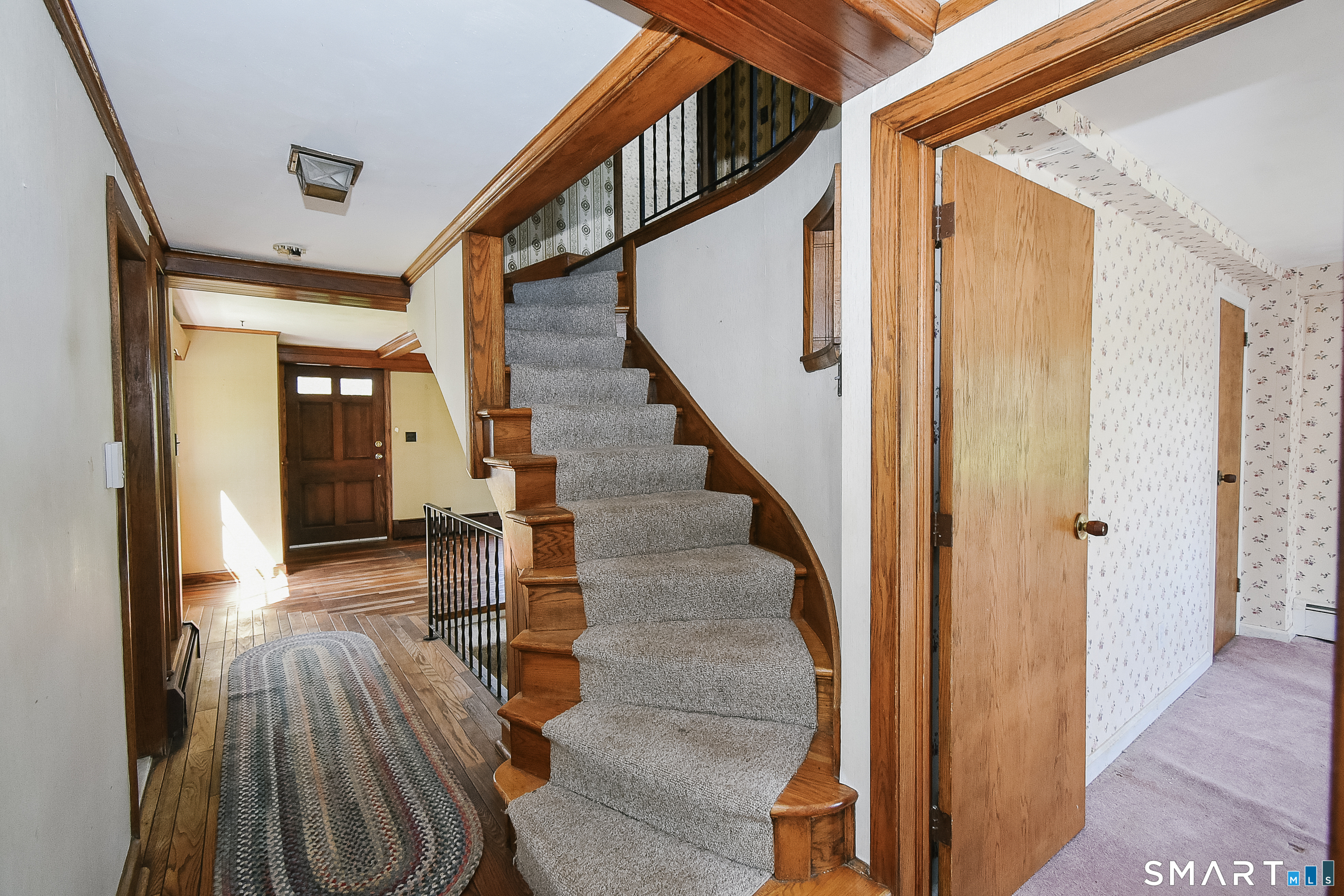 213 Hart Street Berlin, CT 06037 - Photo 23 of 40 a view of entryway and hall with wooden floor