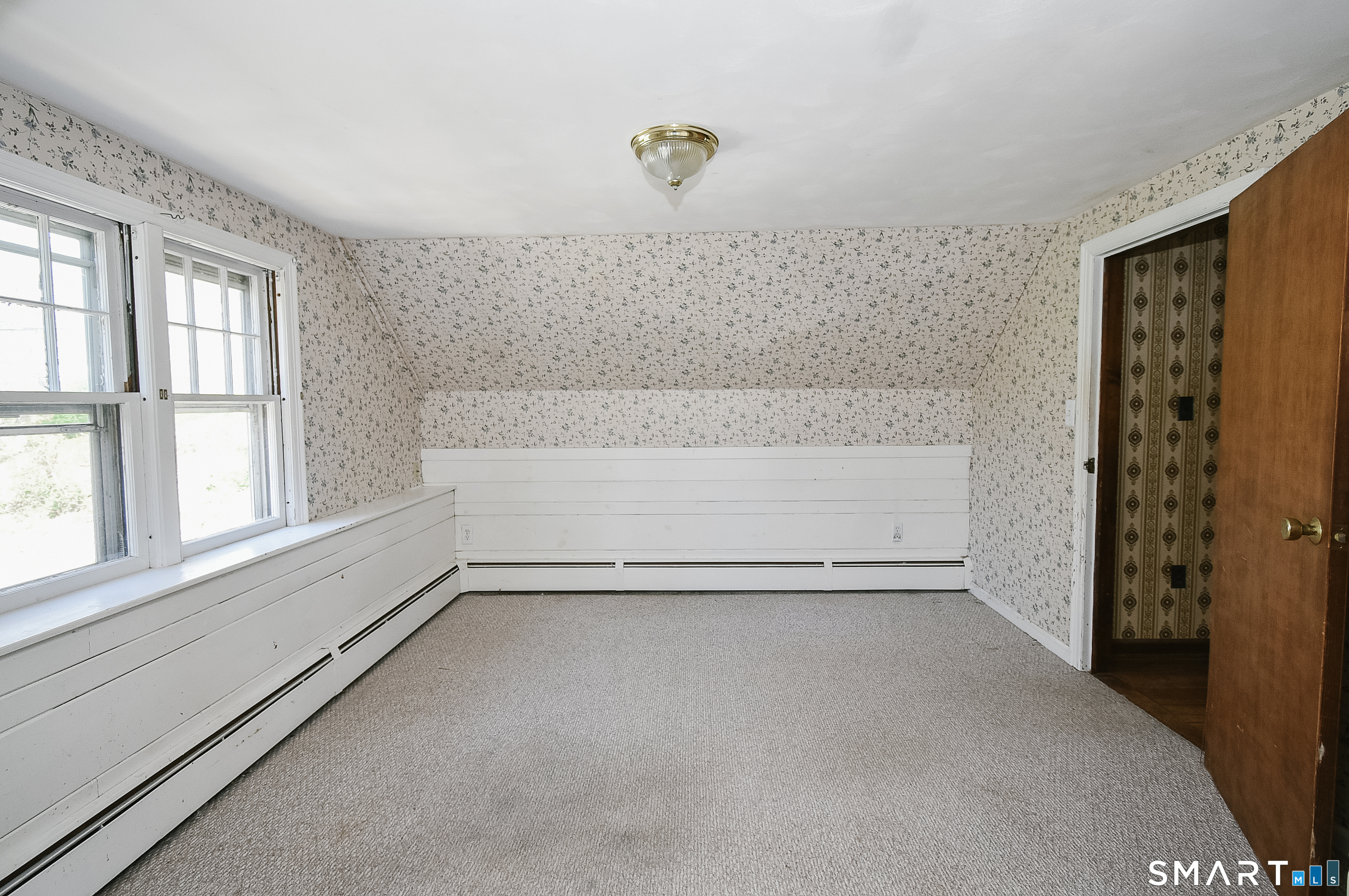 213 Hart Street Berlin, CT 06037 - Photo 24 of 40 a view of an empty room with a window