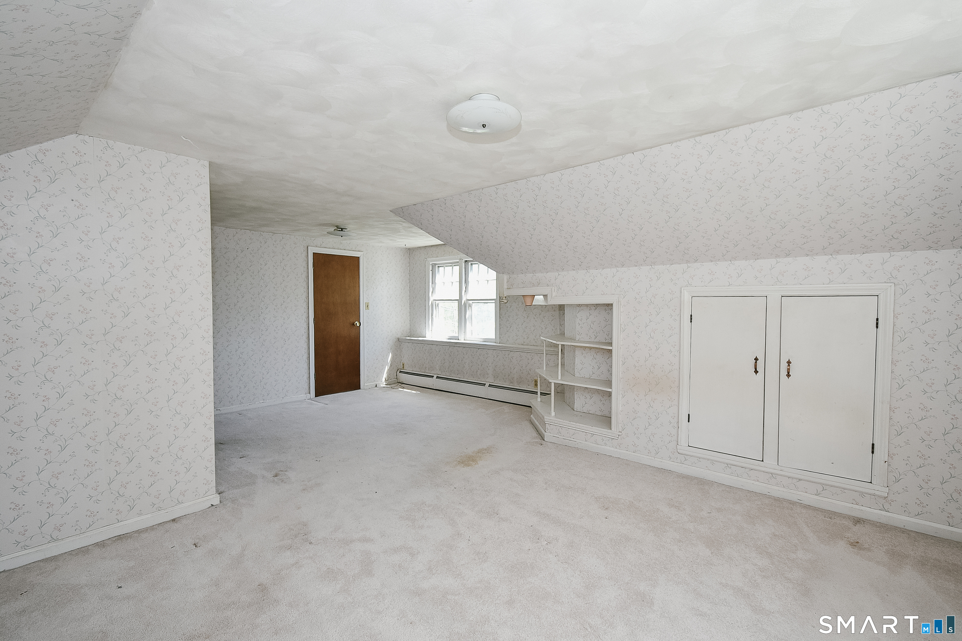 213 Hart Street Berlin, CT 06037 - Photo 27 of 40 a view of empty room with a fireplace