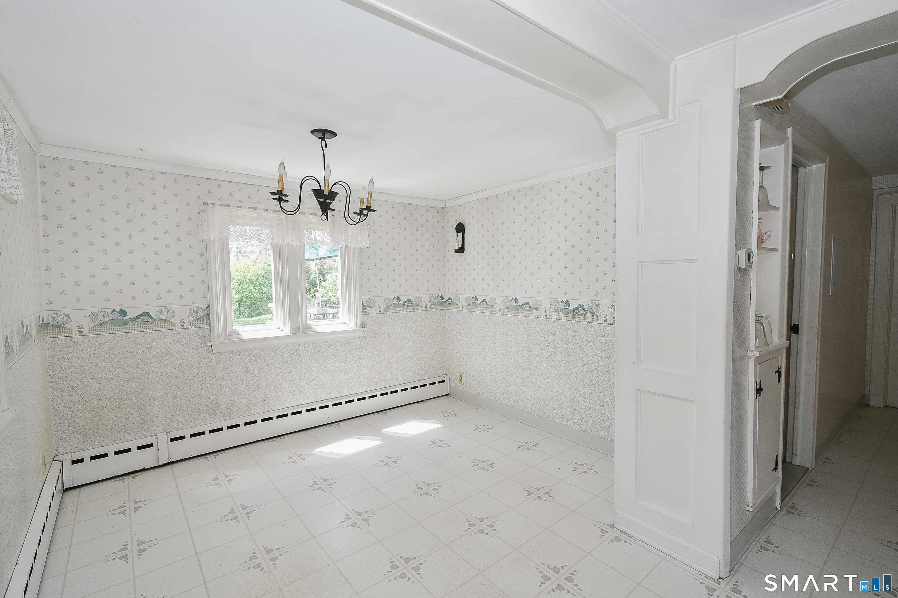 213 Hart Street Berlin, CT 06037 - Photo 32 of 40 a view of a room with window wooden floor and a ceiling fan