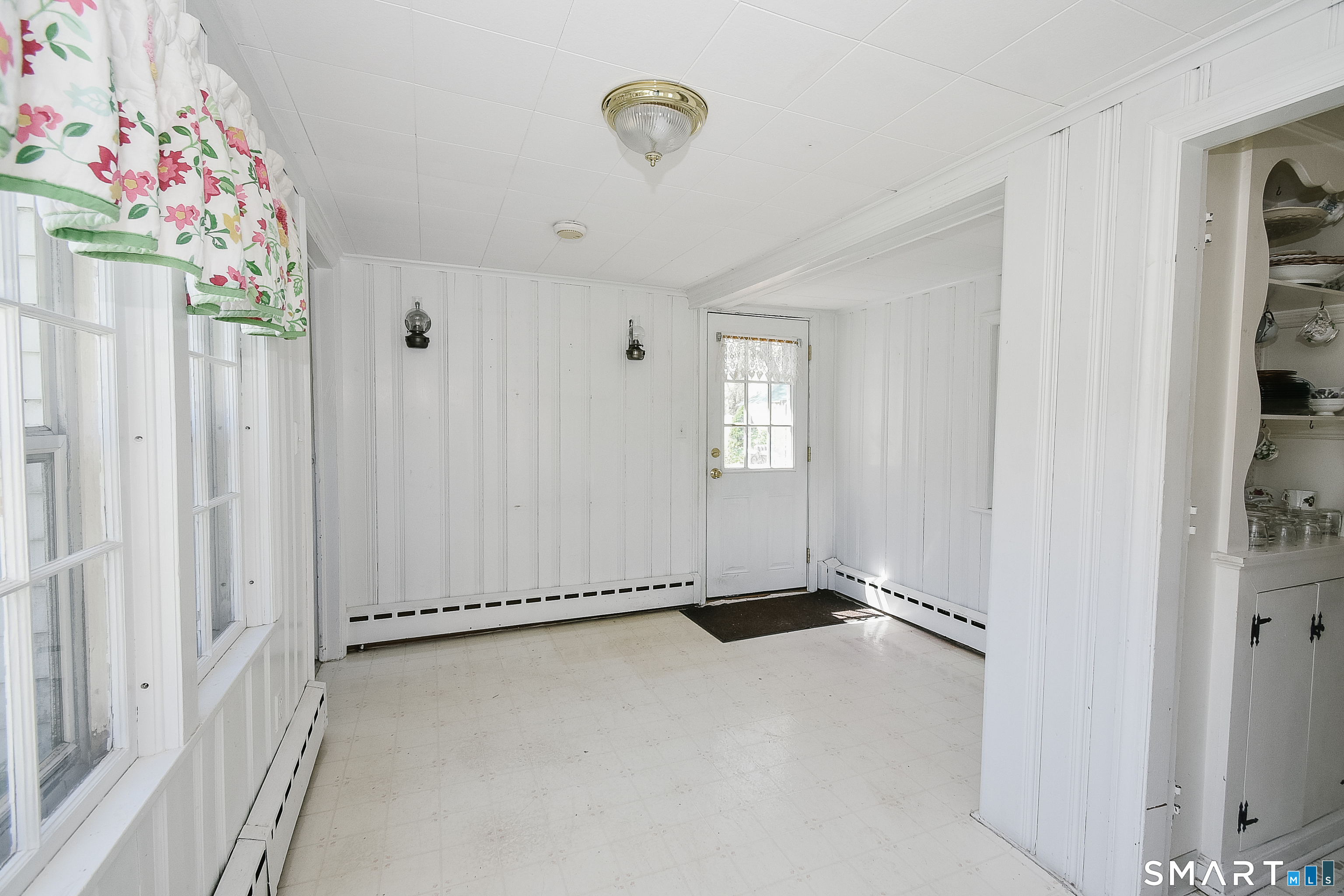 213 Hart Street Berlin, CT 06037 - Photo 36 of 40 a view of an entryway with a flower pot