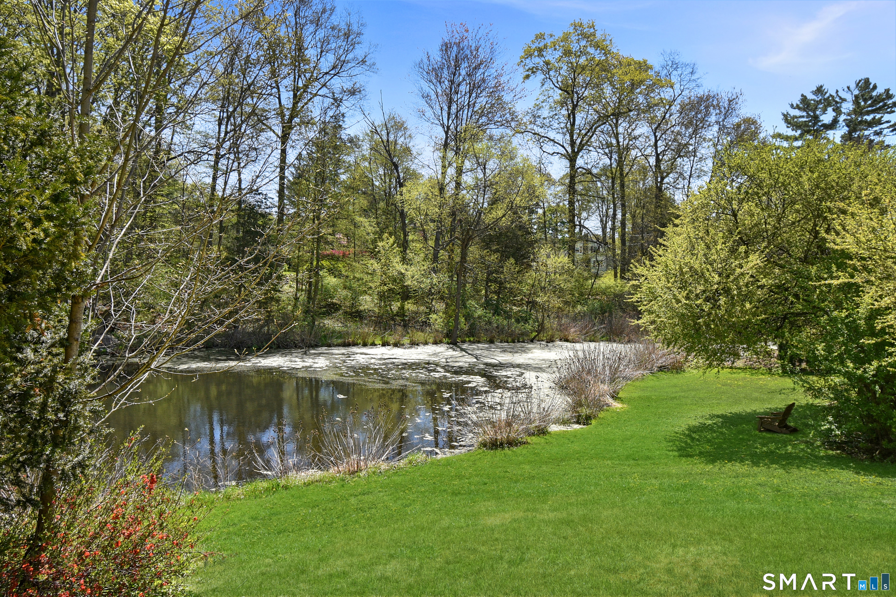 213 Hart Street Berlin, CT 06037 - Photo 8 of 40 a view of a lake with a yard