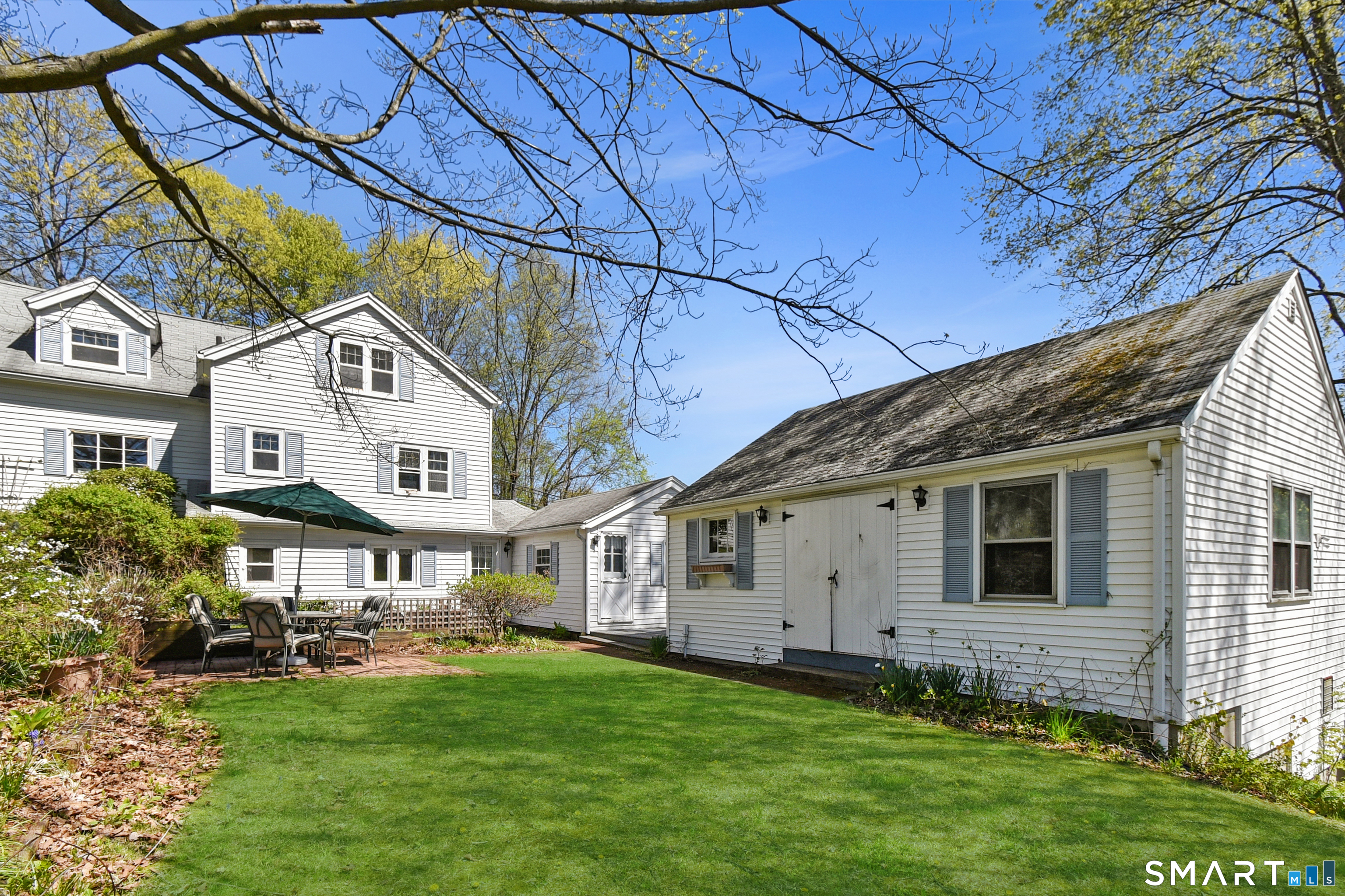 213 Hart Street Berlin, CT 06037 - Photo 9 of 40 a view of a house with a yard