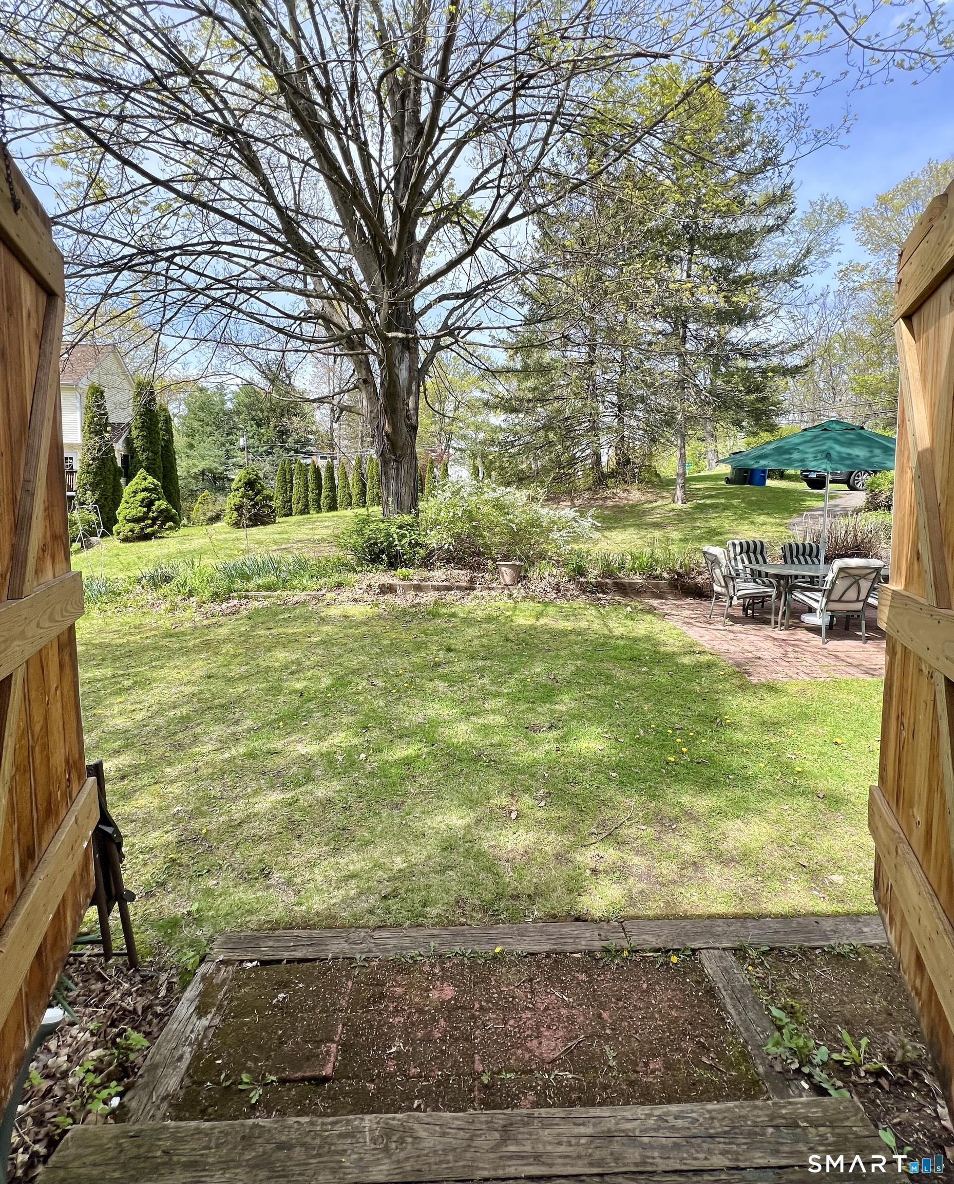 213 Hart Street Berlin, CT 06037 - Photo 10 of 40 a view of a yard with large tree