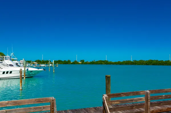 a view of a lake with houses with outdoor space