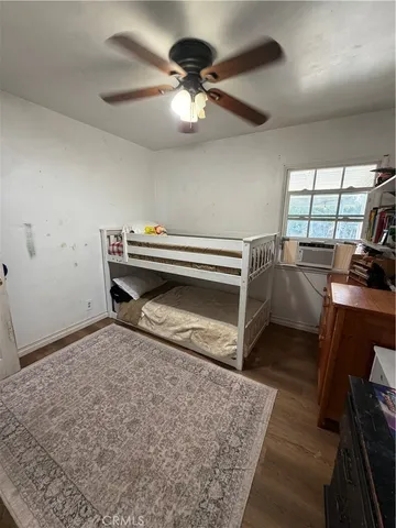 a view of a livingroom with furniture and chandelier