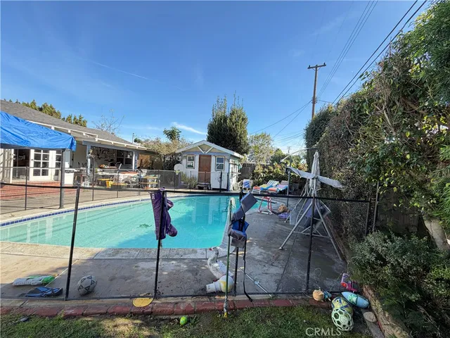 a aerial view of a house with a yard
