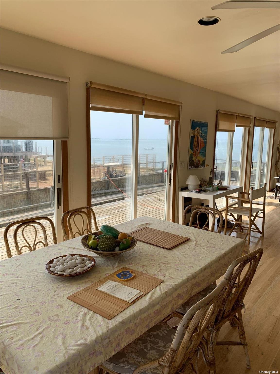 6 Sloop Walk Ocean Beach, NY 11770 - Photo 5 of 11 a view of a dining room with furniture window and outside view