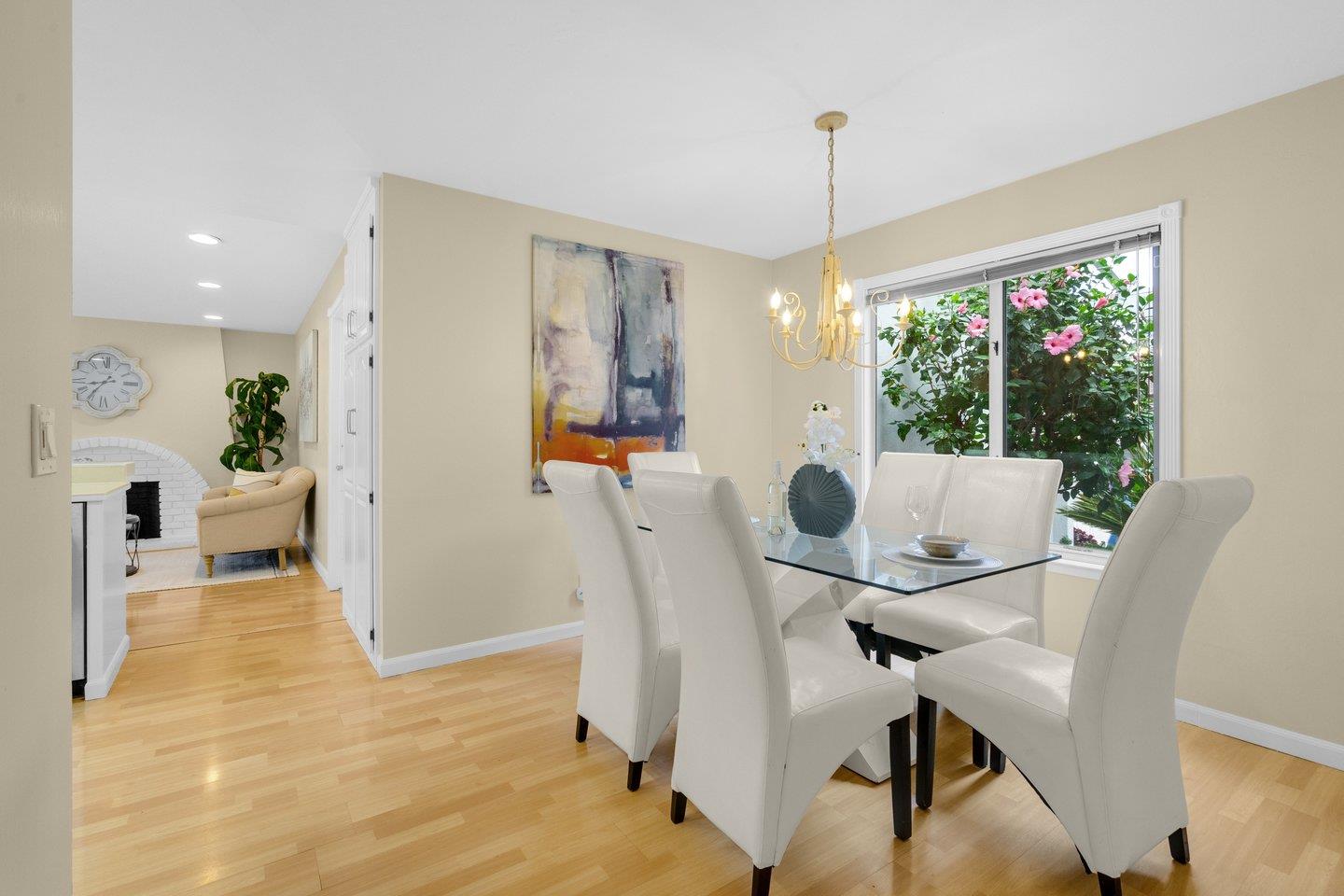 2153 Lacey Drive Milpitas, CA 95035 - Photo 13 of 42 a view of a dining room with furniture window and wooden floor