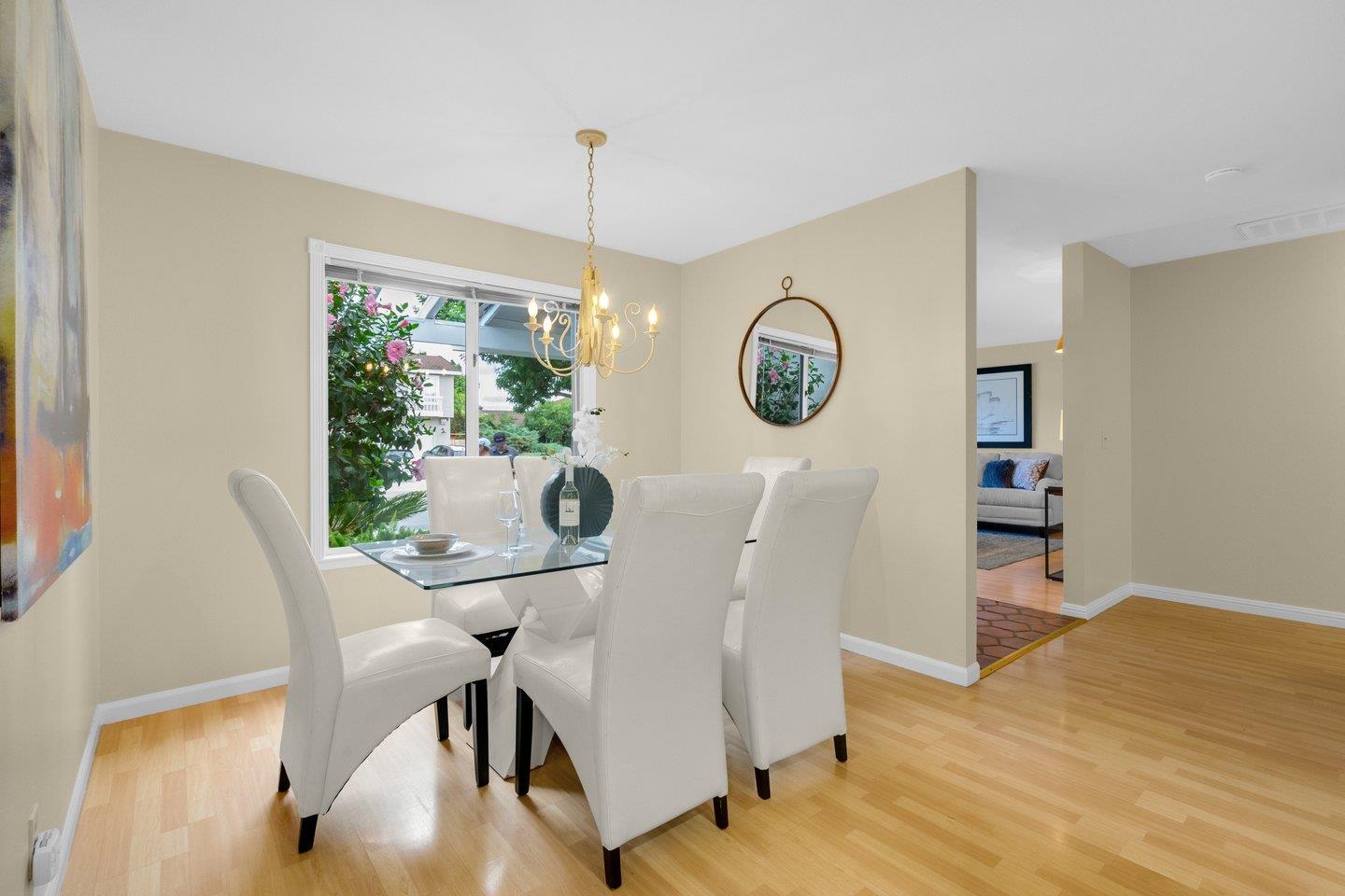 2153 Lacey Drive Milpitas, CA 95035 - Photo 14 of 42 a view of a dining room with furniture window and wooden floor