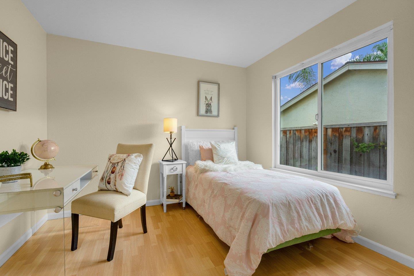 2153 Lacey Drive Milpitas, CA 95035 - Photo 25 of 42 a bedroom with a bed and window