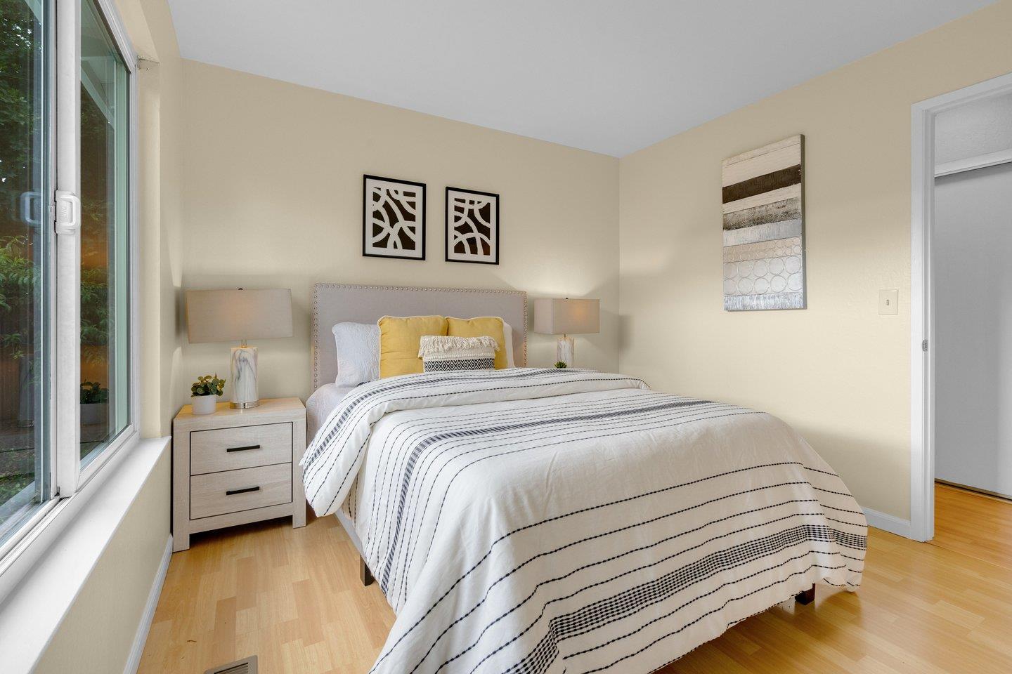 2153 Lacey Drive Milpitas, CA 95035 - Photo 30 of 42 a bedroom with a bed and a window