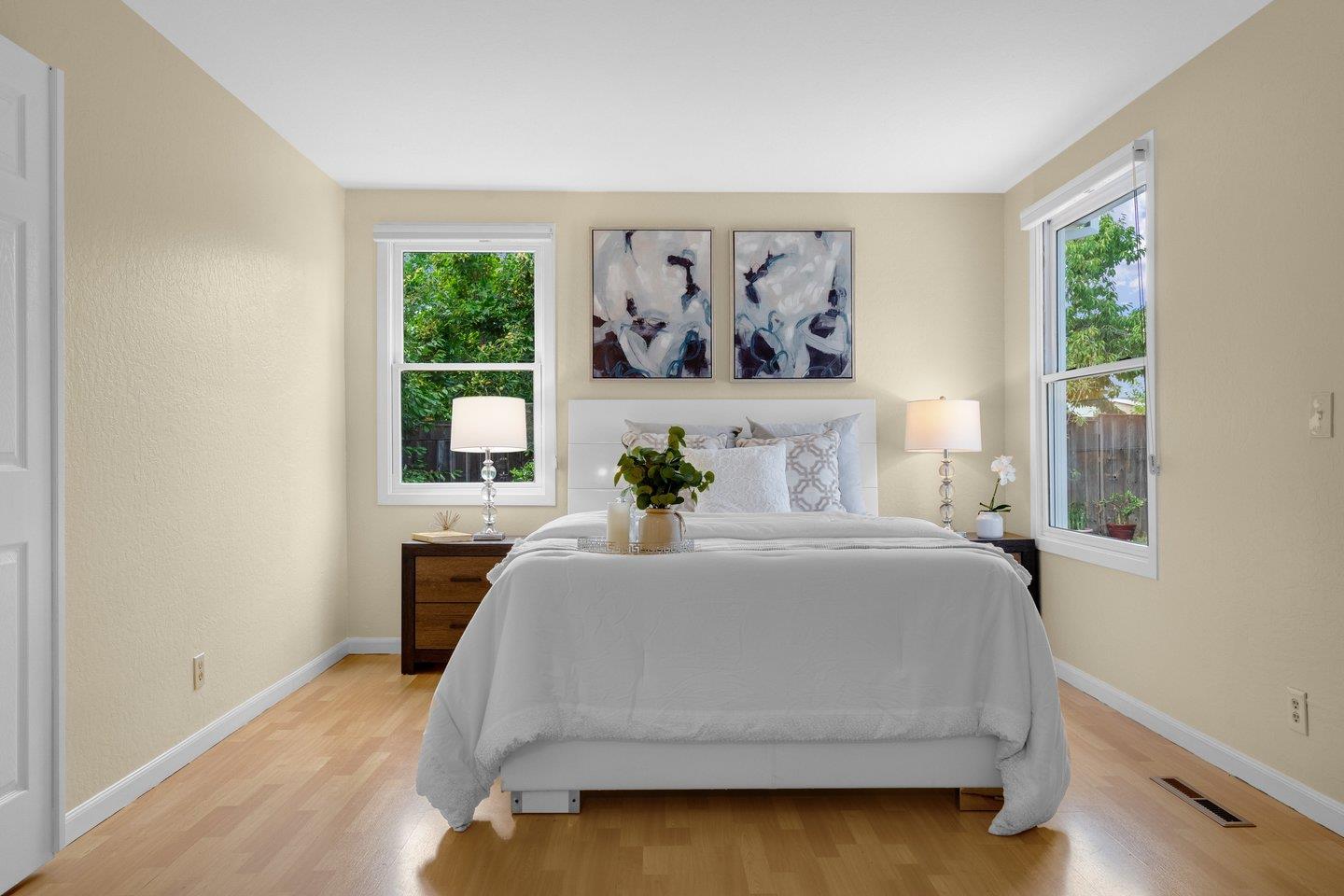 2153 Lacey Drive Milpitas, CA 95035 - Photo 35 of 42 a bedroom with a bed and a large window