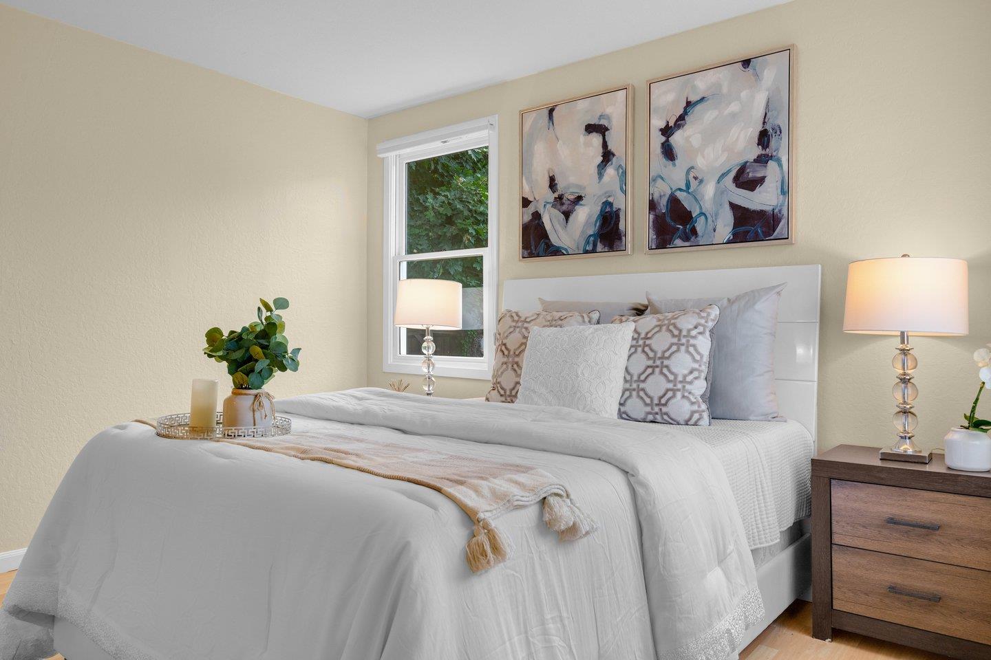 2153 Lacey Drive Milpitas, CA 95035 - Photo 36 of 42 a bedroom with a bed and a painting on the wall