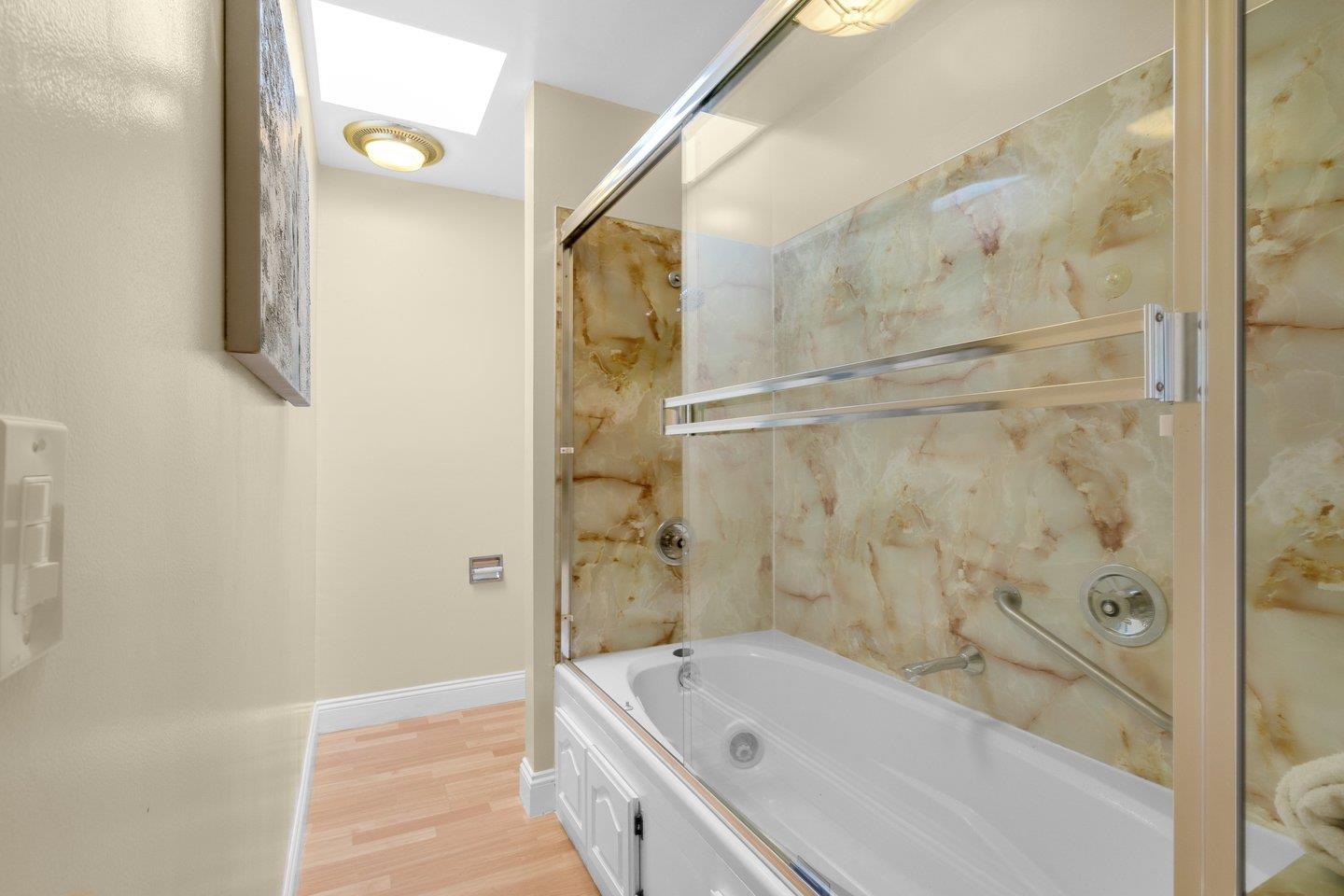 2153 Lacey Drive Milpitas, CA 95035 - Photo 38 of 42 a bathroom with a bathtub and shower