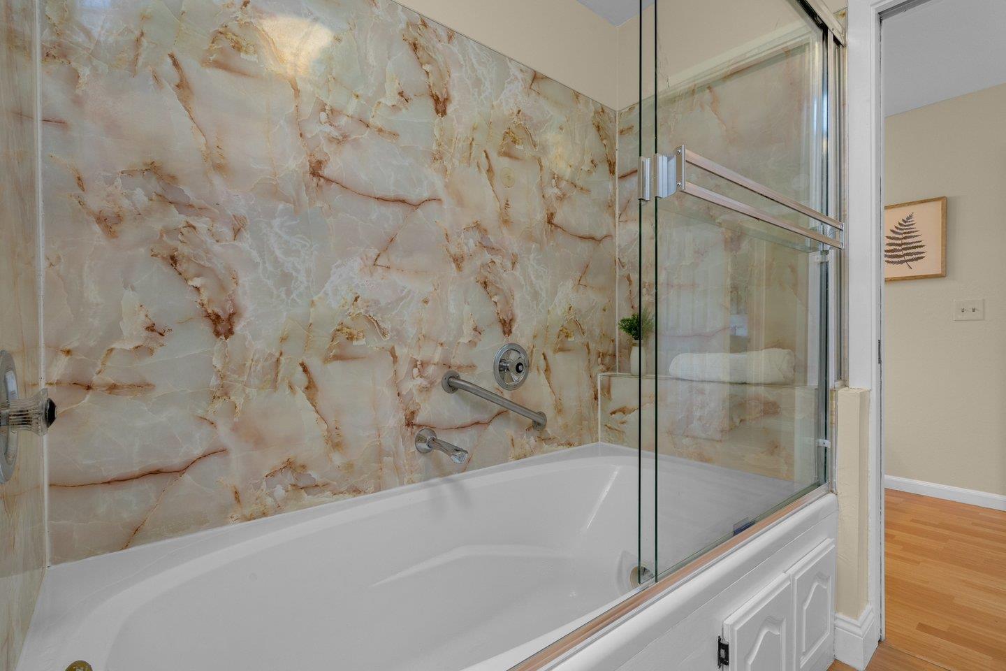 2153 Lacey Drive Milpitas, CA 95035 - Photo 39 of 42 a bathroom with a bathtub and shower